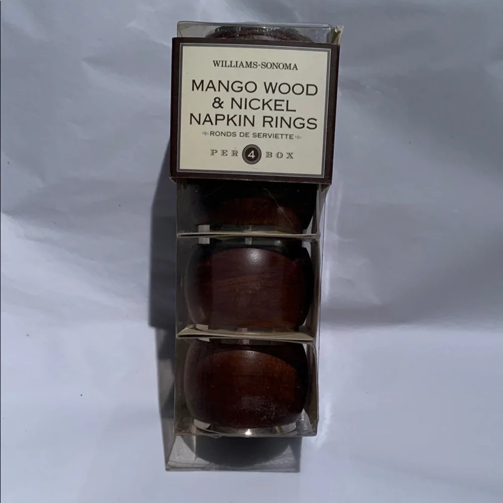 Williams Sonoma Mango wood & nickel napkin rings.